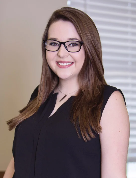 jaylynn boone Jaylynn the project manager and search specialist smiling for her headshot
